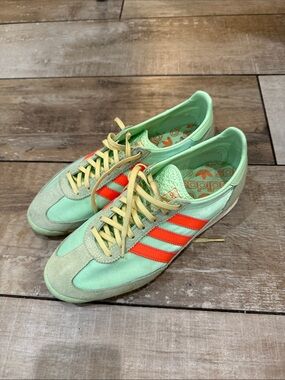 adidas Mint Green Sneakers with Neon Orange Stripes
